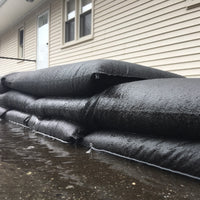 Close up of Quick Dam Flood Bag fabric designed to absorb and retain water for durable reusable flood protection.