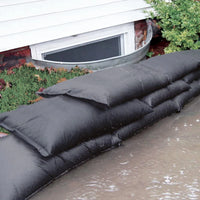 Quick Dam Flood Bags water activated sandless flood protection barrier compact and lightweight before use.