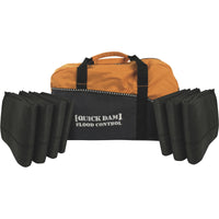 Quick Dam Flood Control duffle bag kit with folded black flood barriers for portable and reliable flood protection.