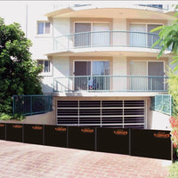 Multiple Quick Dam Flood Gates installed across an apartment building garage entrance providing strong flood protection for underground parking.