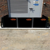 Quick Dam Flood Gates with stanchions installed at a commercial doorway providing heavy-duty flood protection and water barrier security.