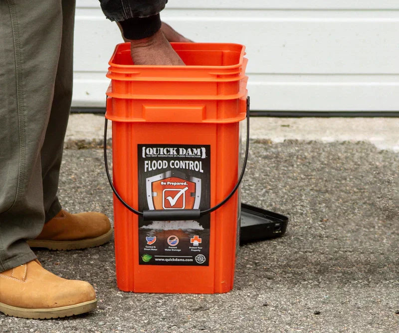 Man using orange bucket kit