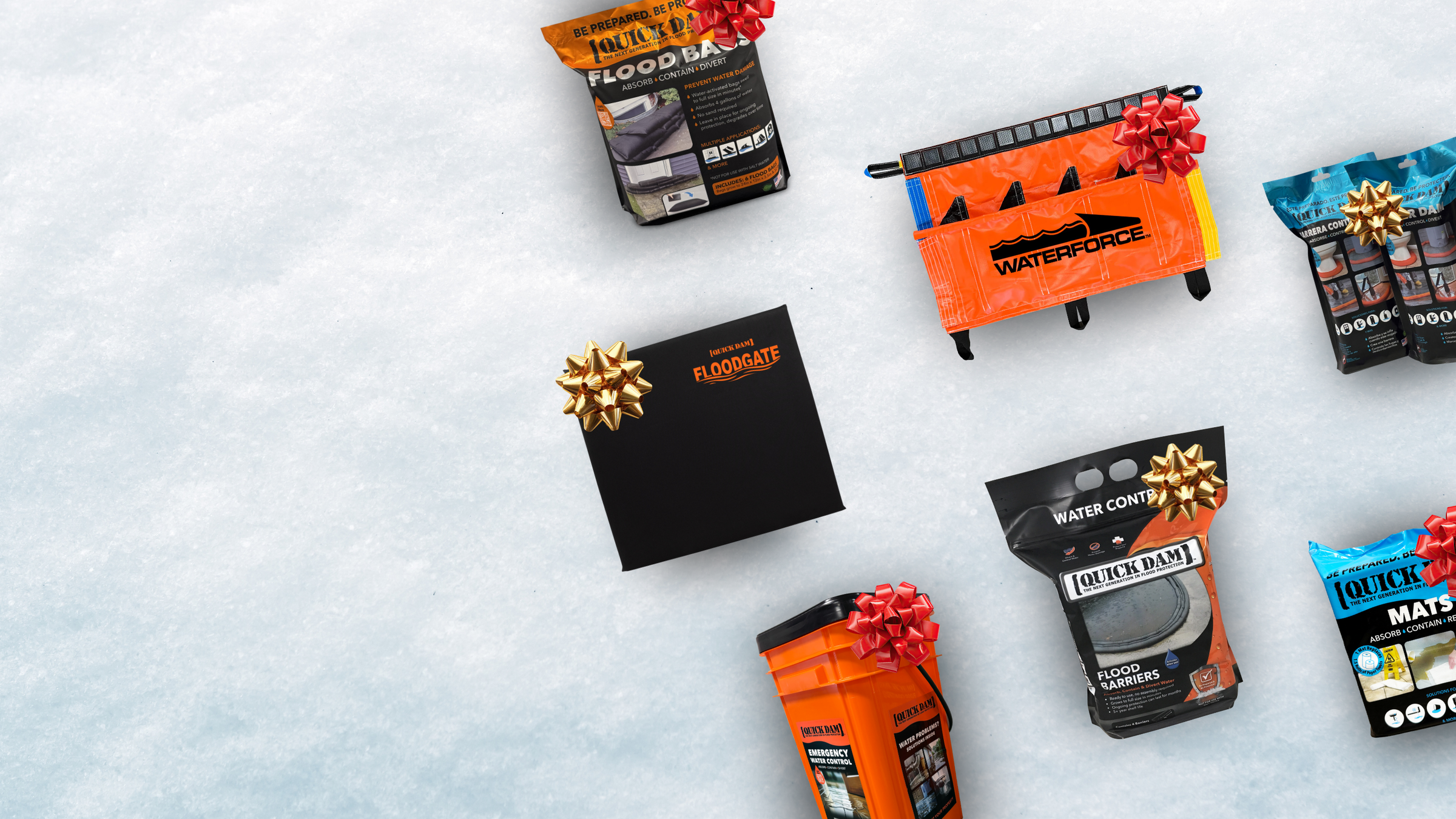 Collection of outdoor gear packages on a snowy background