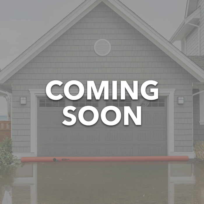 Log Dam COMING SOON displayed in front of a house with flood prevention measures