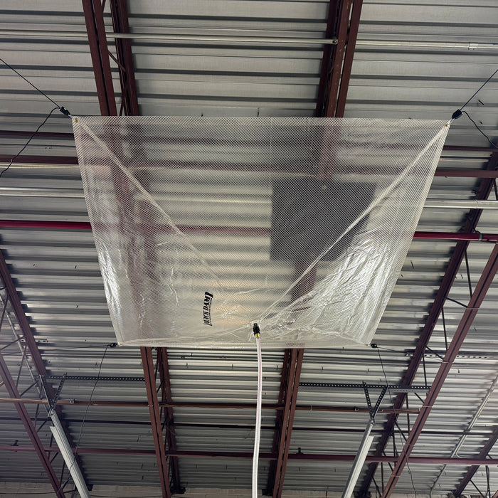 Ceiling with a large clear leak diverter with 'Quick Dam' branding.