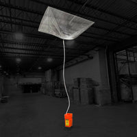 Quick Dam Leak Diverter hanging from the ceiling in a warehouse setting