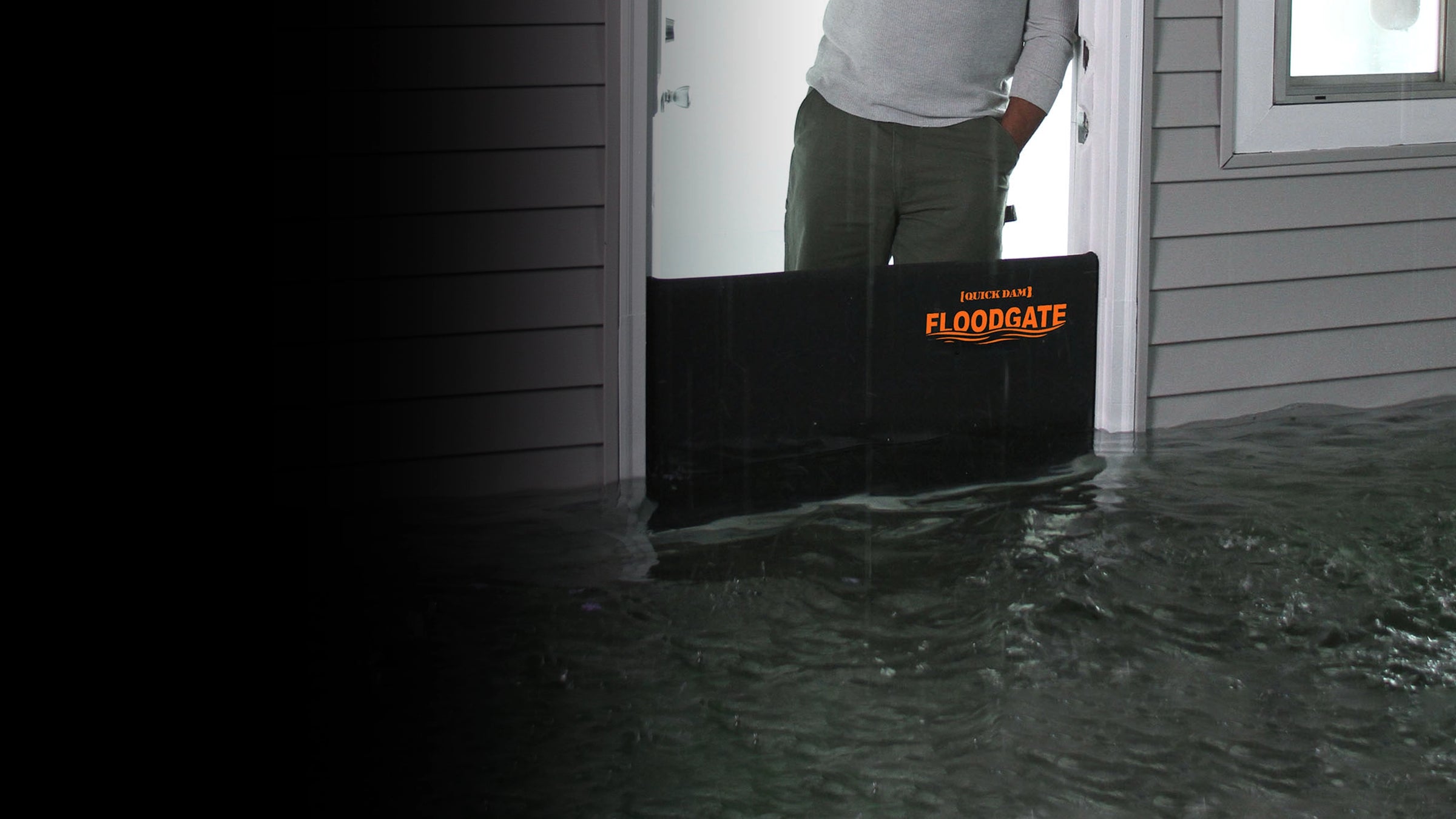 Flood Gate being used to prevent water from entering a house during flooding