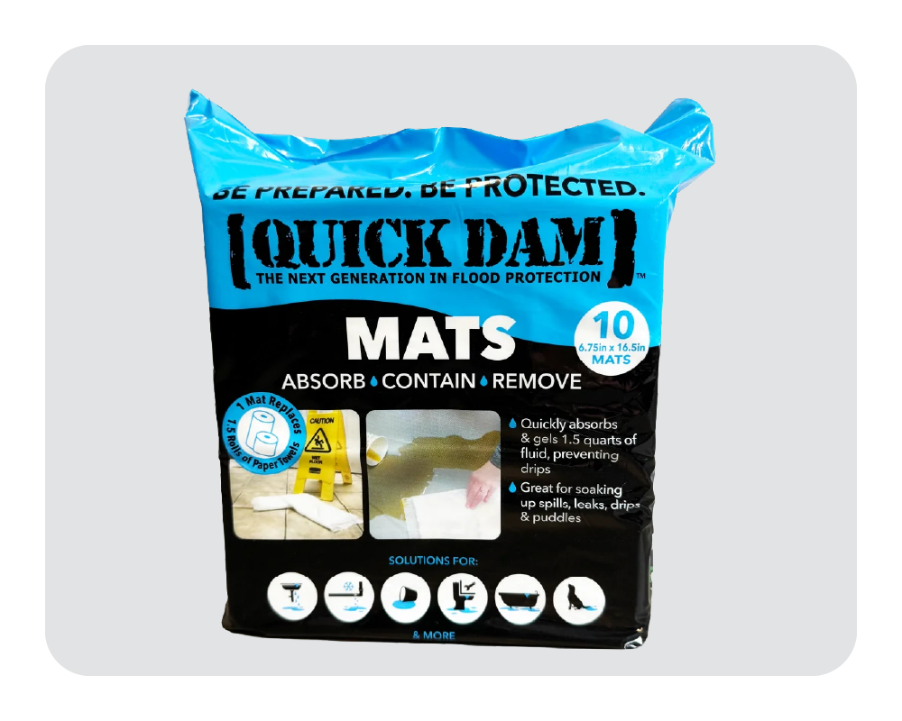 Packaging of Quick Dam Mats on a white background