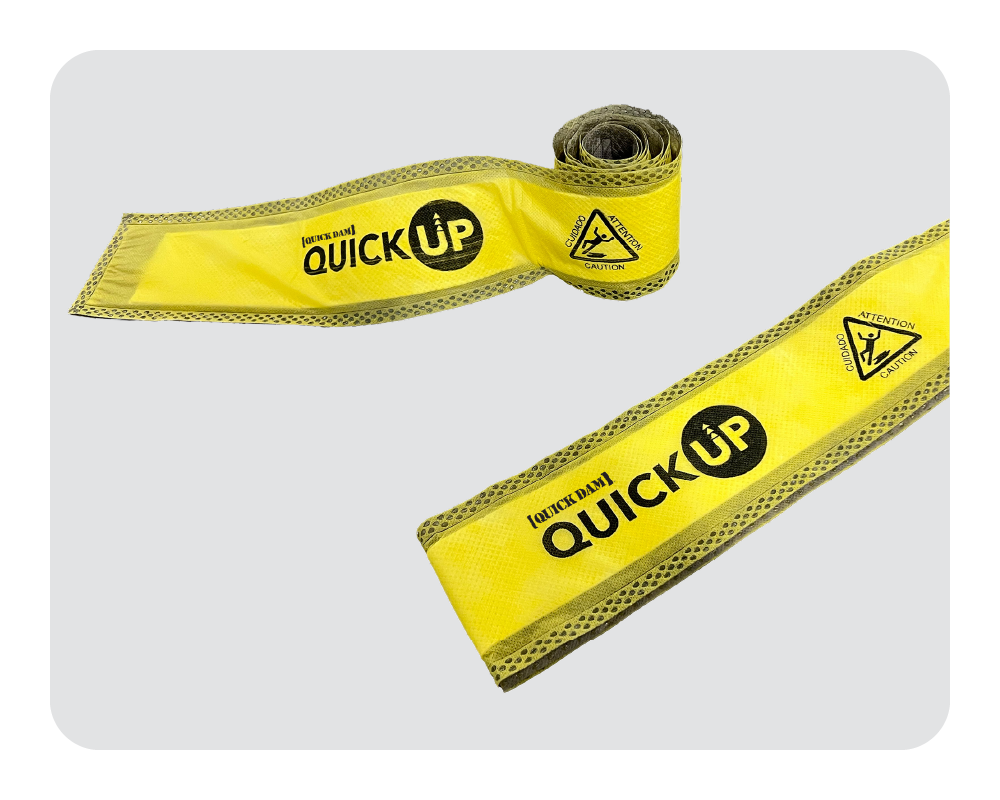 Two rolls of yellow Quick Ups on a white background