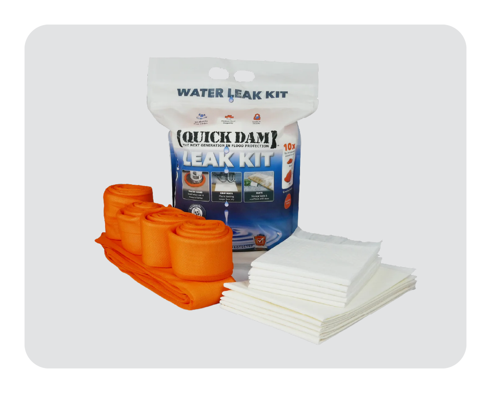 Quick Dam leak kit with orange water dams, mats and drip mats on a white background