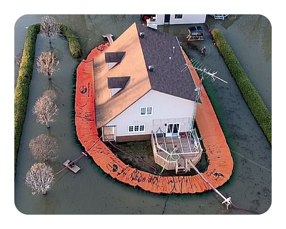 Aerial view of a house surrounded by orange water force