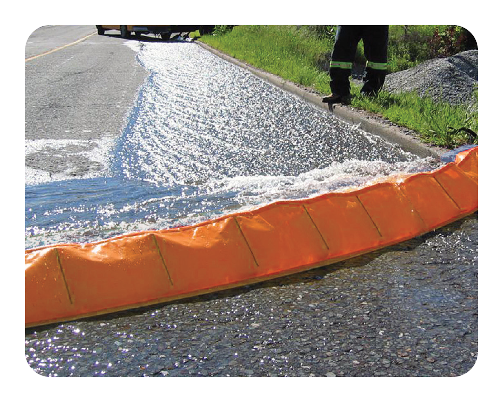 Orange water force on a road with water being diverted