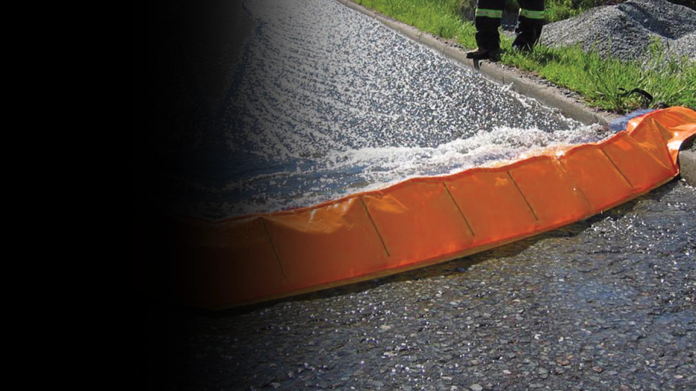 Water Force stopping and redirecting water on a street